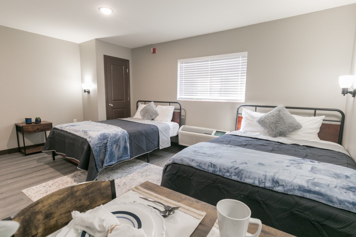 Affordable studio apartment interior in Nashville TN with modern finishes, natural light, and fully equipped kitchen